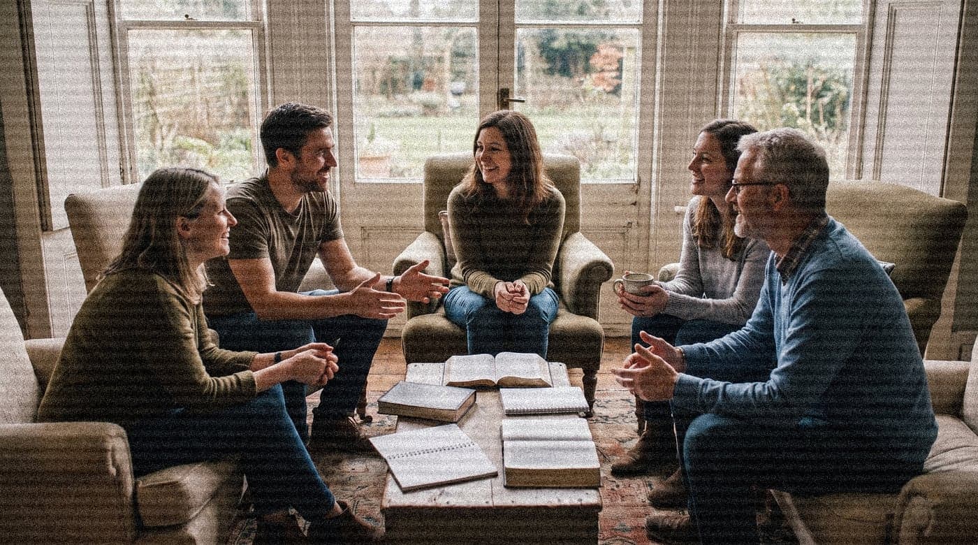 A small group bible study talking together