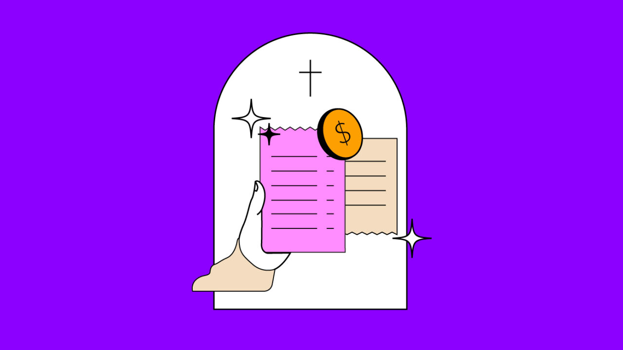hand holding a church finance report near a church window